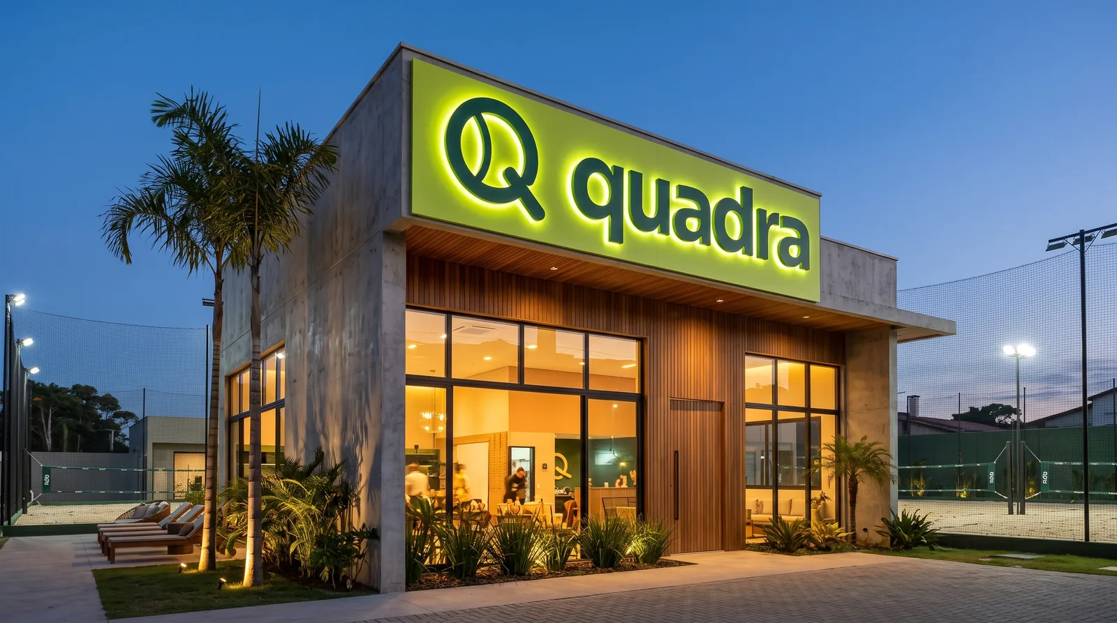 Club storefront with the Quadra sign lit up